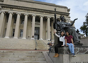 two female students outside low library