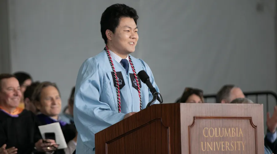 Xuezhen Wang delivers the valedictory address at the 2024 GS Class Day Ceremony