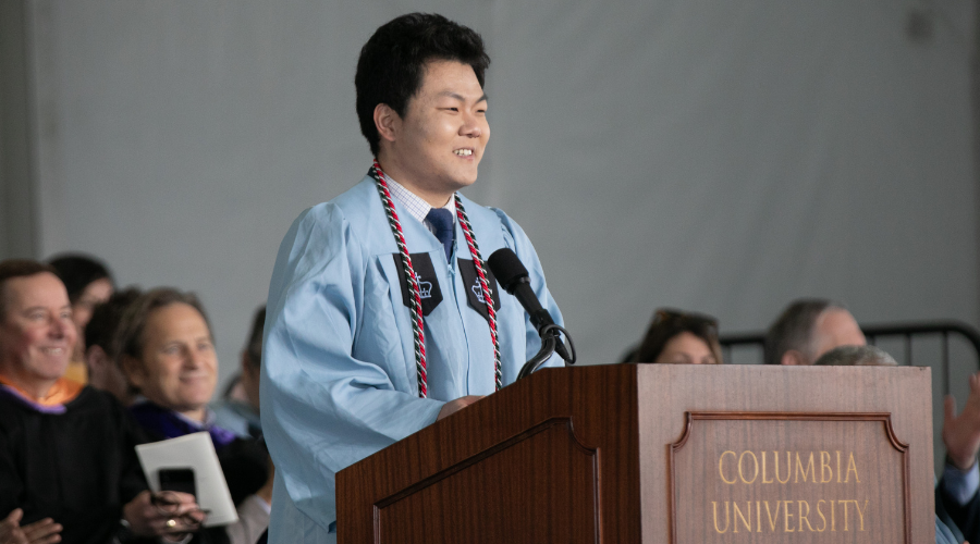 Xuezhen Wang delivers the valedictory address at the 2024 GS Class Day Ceremony